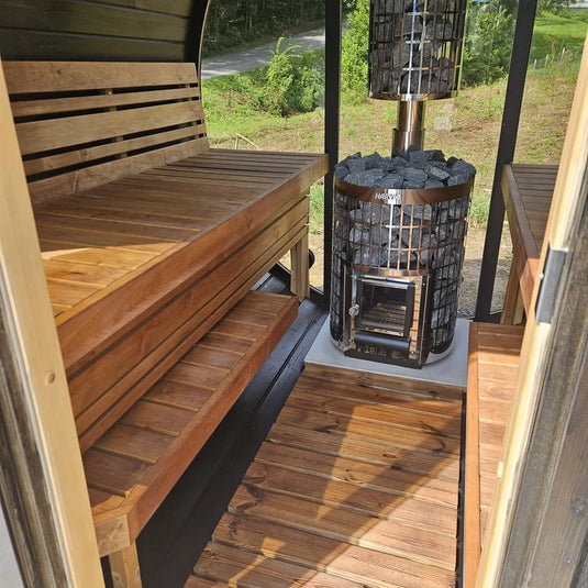 Lux Vulcano 6-person barrel sauna interior with facing wood benches 