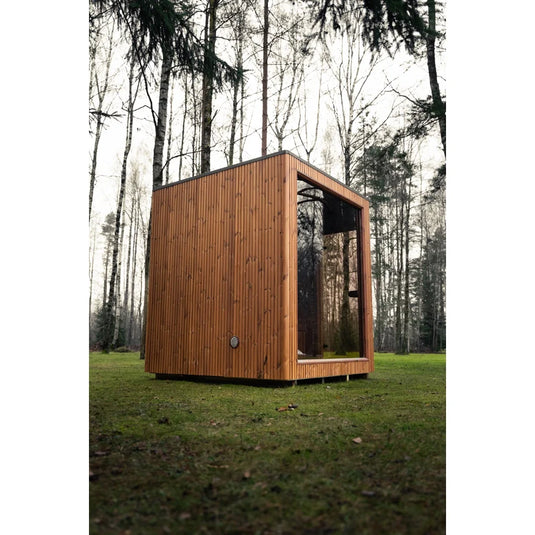 Heritage Lux Dolomiti 4-6 person sauna in a natural outdoor setting