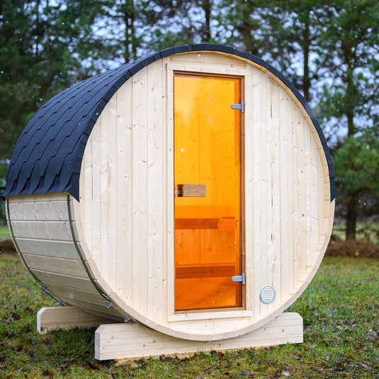 Lumina outdoor sauna side view showing rounded wood body