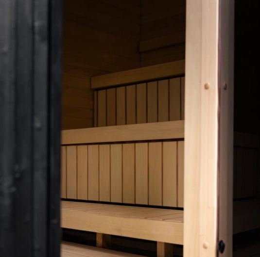 Lux Stromboli 6-8 person sauna interior with tiered wood benches