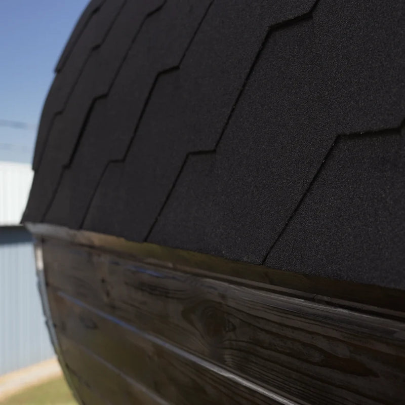 Load image into Gallery viewer, Lux Vulcano 6-person barrel sauna side view showing curved wood staves and roofing
