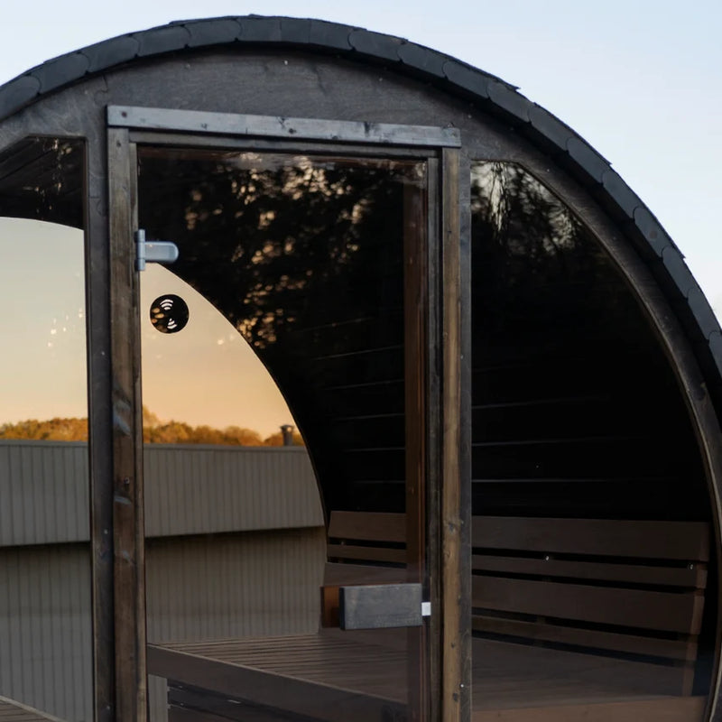 Load image into Gallery viewer, Lux Vulcano  Close-up of barrel sauna door, wood staves, and end panel
