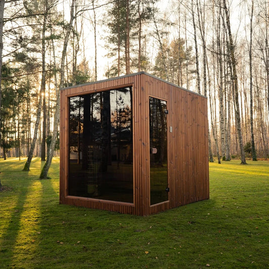 Heritage Sauna® Lux Dolomiti Architectural sauna in a forest setting
