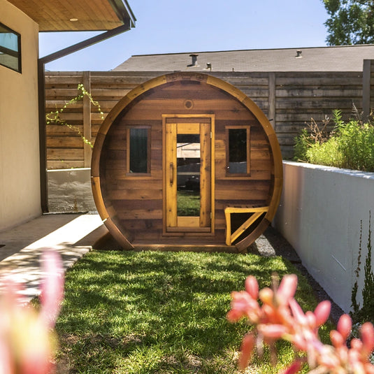 Heritage Sauna® flat barrel outdoor sauna, front exterior view, stained