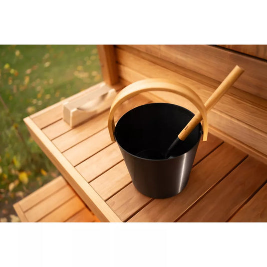 Panorama Grand 6-person sauna interior with tiered benches and sauna bucket