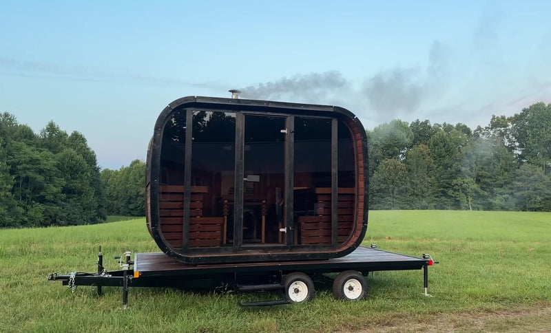 Load and play video in Gallery viewer, Mobile Lux Halo Sauna Trailer 6-8-Person with HUUM heater | Heritage Sauna®


